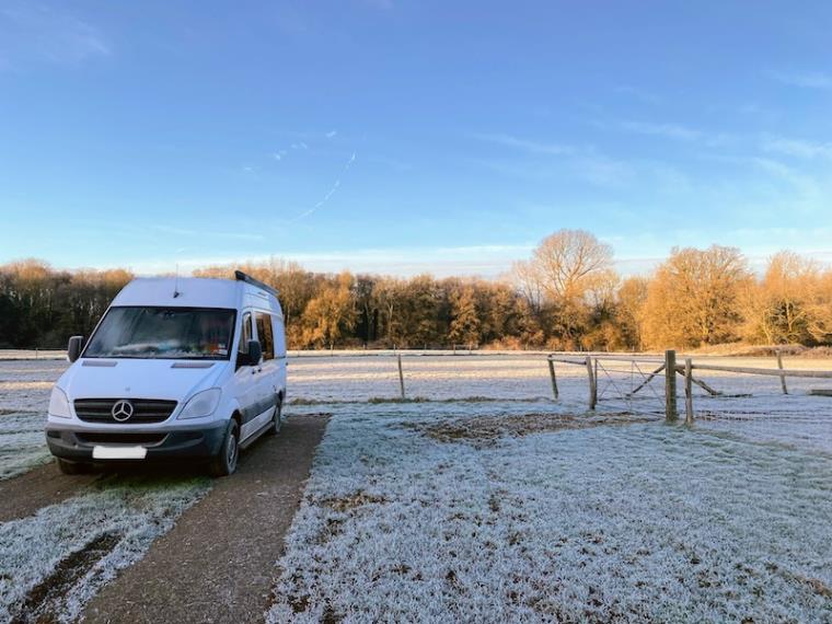 White Mercedes Sprinter van in frosty field