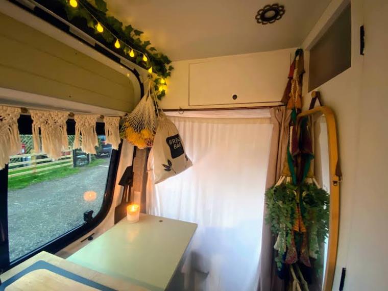 Campervan kitchen with fruit and bread storage hacks