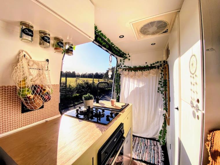 Interior of Mercedes Benz Sprinter van conversion with kitchen