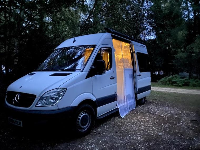 Campervan in New Forest at dusk